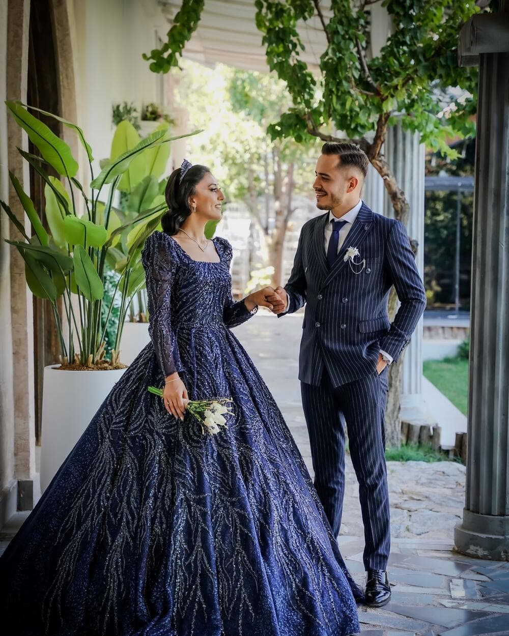 A couple sharing a joyful moment at their wedding